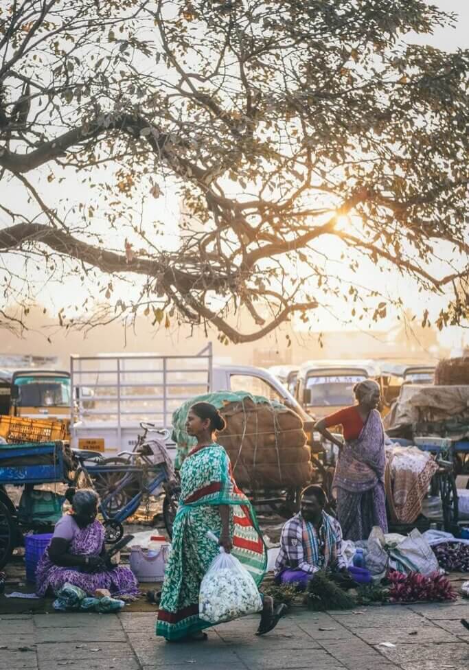 Woman walking in a city in India